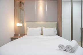 Nice and New 1BR with Office Room at Daan Mogot City Apartment By Travelio